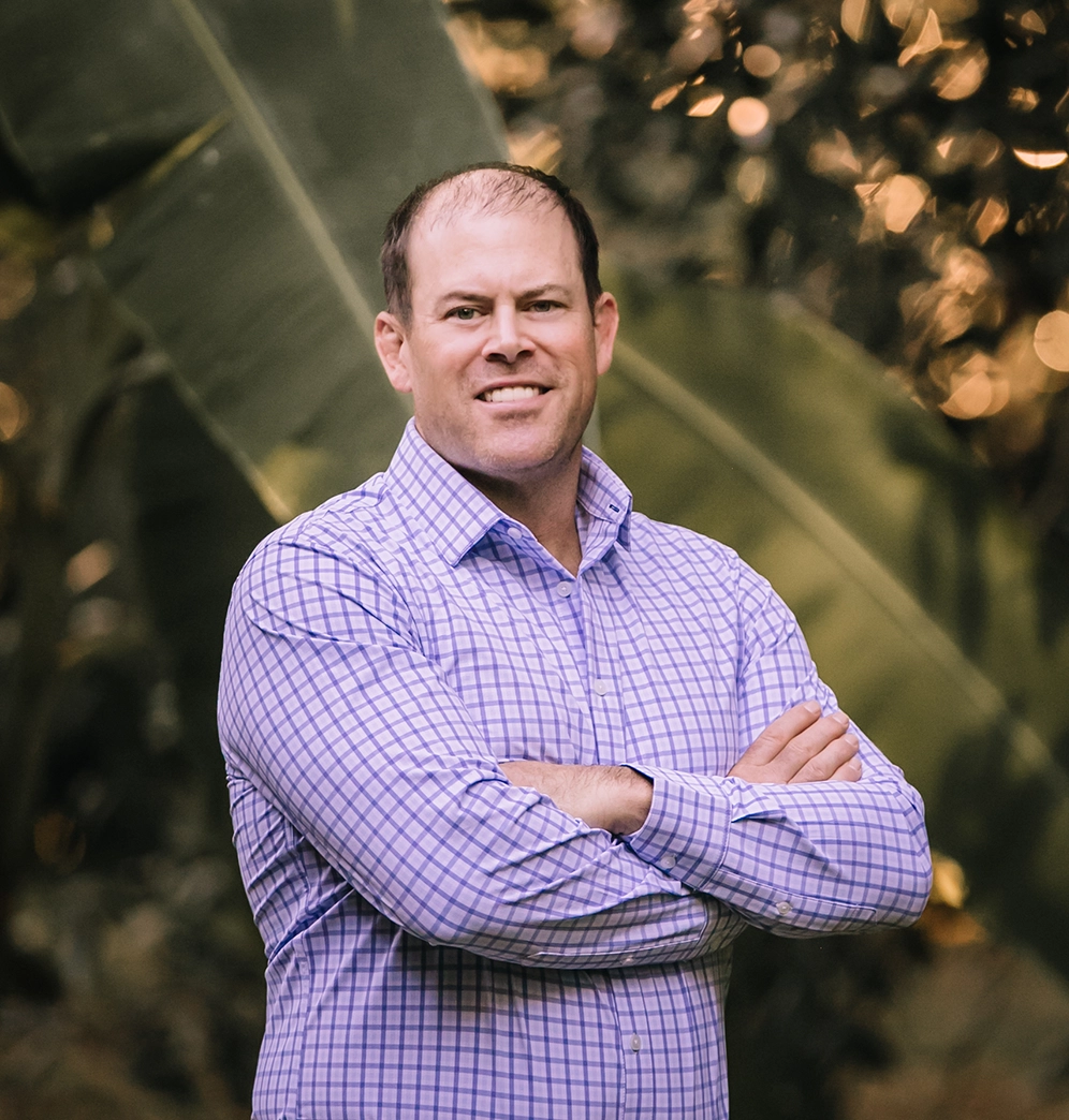 CB Lorch standing with arms crossed